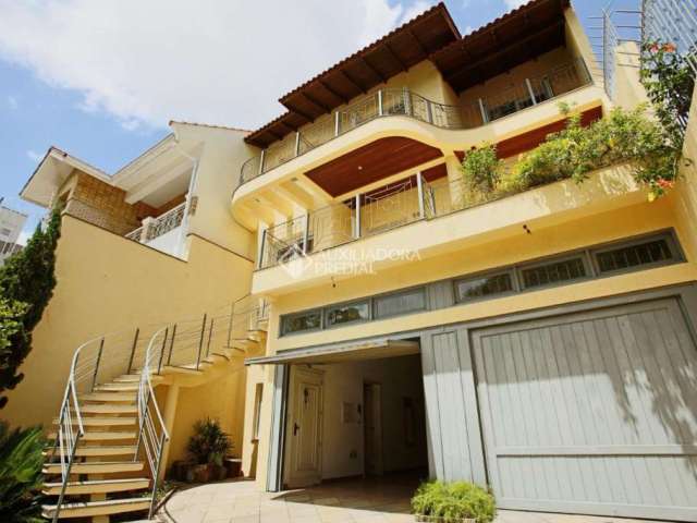 Casa com 5 quartos à venda na Rua Isidoro Tressi, 507, Jardim Botânico, Porto Alegre, 379 m2 por R$ 1.700.000