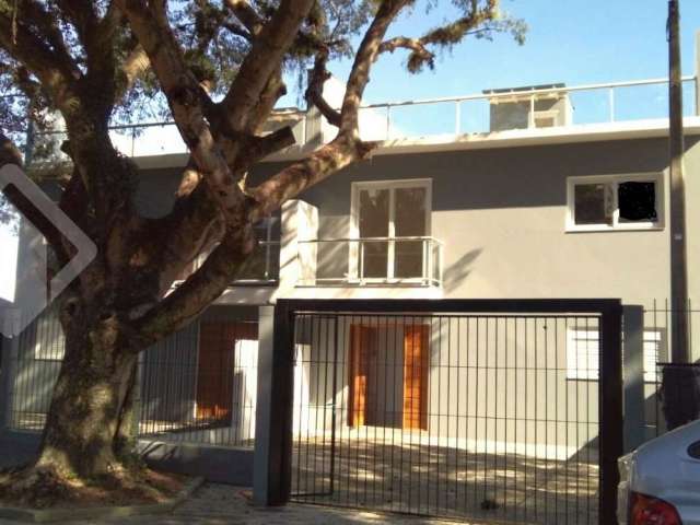 Casa em condomínio fechado com 3 quartos à venda na Rua Jacundá, 80, Guarujá, Porto Alegre, 159 m2 por R$ 586.000