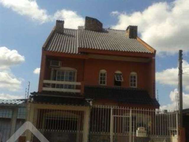 Casa em condomínio fechado com 3 quartos à venda na Rua Santa Maria, 186, São José, Porto Alegre, 279 m2 por R$ 850.000