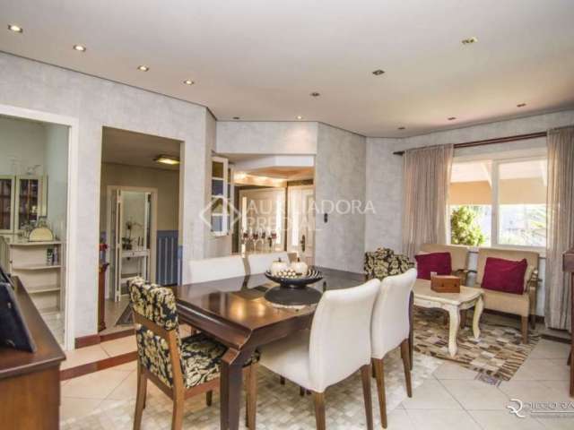 Casa em condomínio fechado com 3 quartos à venda na Estrada Capitão Gentil Machado de Godoy, 4500, Vila Elsa, Viamão, 230 m2 por R$ 1.050.000