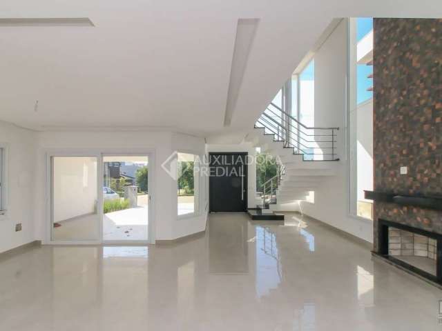 Casa em condomínio fechado com 4 quartos à venda na JOAO-DE-BARRO, 788, Branquinha, Viamão, 284 m2 por R$ 1.800.000