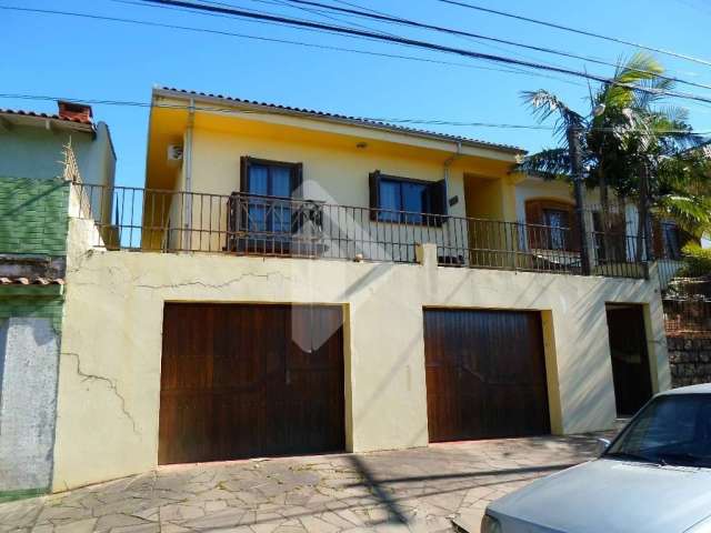 Casa em condomínio fechado com 3 quartos à venda na Rua Arnaldo Ballve, 695, Jardim Itu Sabará, Porto Alegre, 198 m2 por R$ 550.000