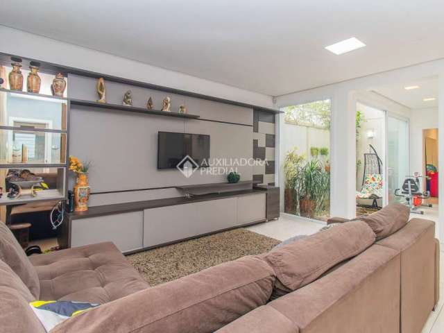 Casa com 3 quartos à venda na Rua Delfino Riet, 297, Santo Antônio, Porto Alegre, 253 m2 por R$ 1.550.000