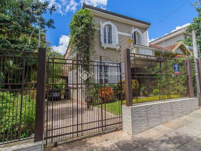 Casa com 4 quartos à venda na Rua Paissandu, 80, Partenon, Porto Alegre, 240 m2 por R$ 1.450.000