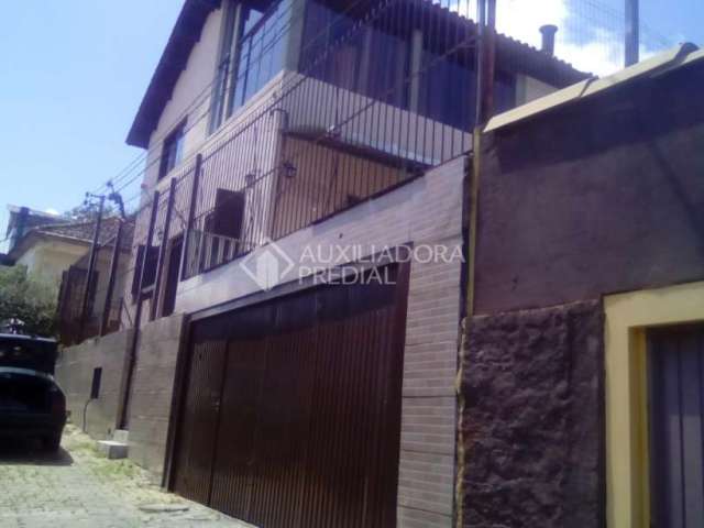 Casa em condomínio fechado com 3 quartos à venda na Rua Martins de Lima, 736, Vila São José, Porto Alegre, 155 m2 por R$ 370.000