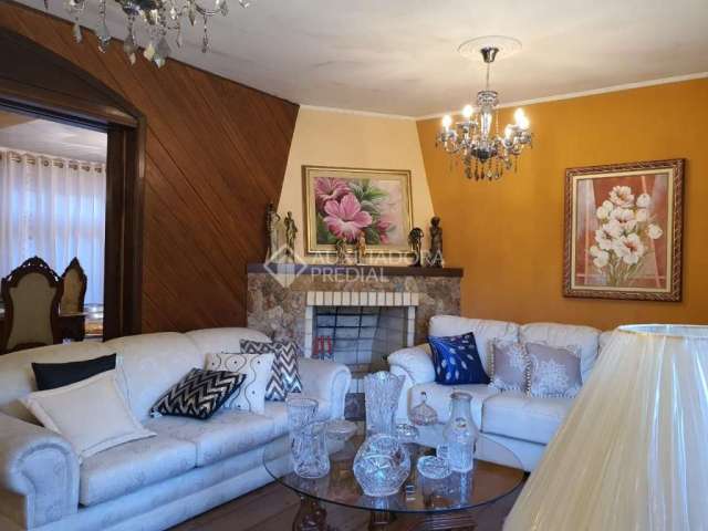 Casa em condomínio fechado com 3 quartos à venda na Rua Roque Gonzales, 76, Jardim Botânico, Porto Alegre, 233 m2 por R$ 1.400.000