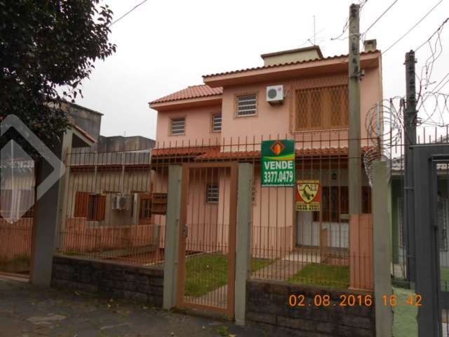 Casa em condomínio fechado com 3 quartos à venda na Rua Bartolomeu Dias, 708, Jardim Itu Sabará, Porto Alegre, 225 m2 por R$ 650.000