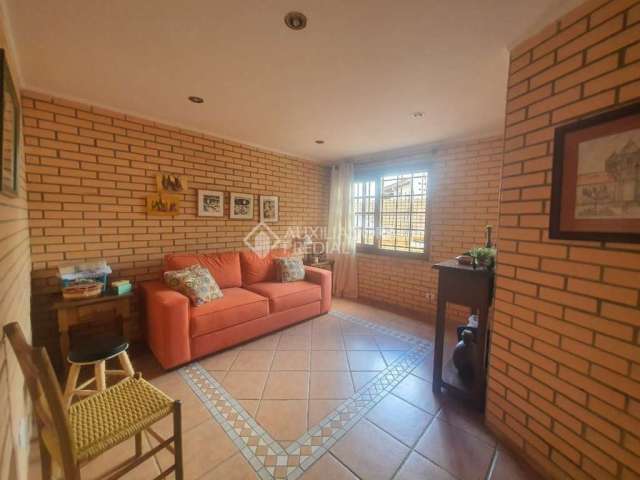 Casa com 5 quartos à venda na Rua Mutualidade, 48, Santa Tereza, Porto Alegre, 420 m2 por R$ 950.000