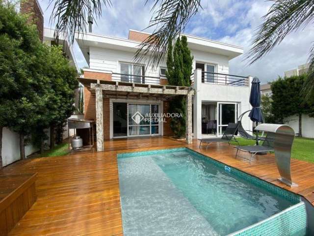 Casa em condomínio fechado com 4 quartos à venda na Avenida Açucena, 50, Estância Velha, Canoas, 317 m2 por R$ 2.990.000