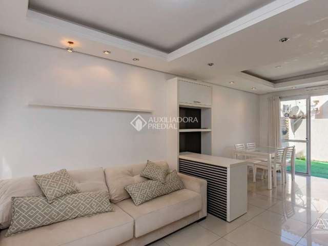 Casa em condomínio fechado com 2 quartos para alugar na Rua Aurora, 1200, Marechal Rondon, Canoas, 135 m2 por R$ 3.200