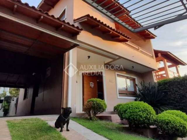 Casa em condomínio fechado com 3 quartos à venda na Rua da Prosperidade, 179, Estância Velha, Canoas, 178 m2 por R$ 870.000