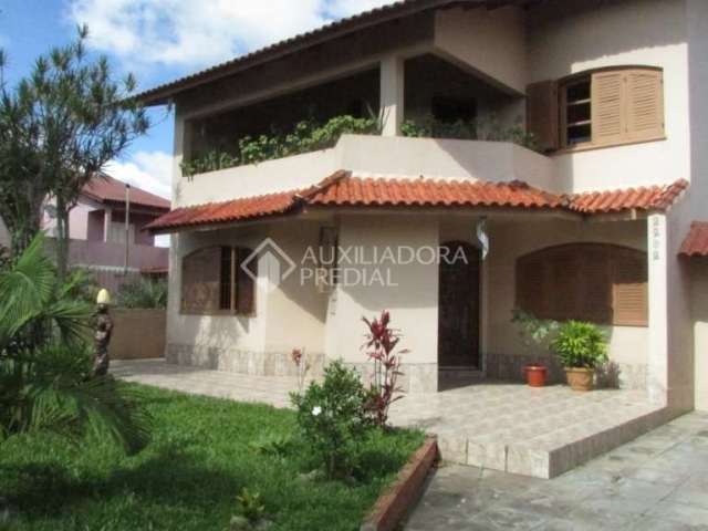 Casa em condomínio fechado com 3 quartos à venda na Rua Tamoio, 2292, Niterói, Canoas, 240 m2 por R$ 950.000