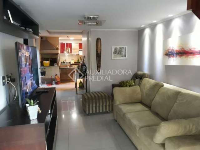 Casa em condomínio fechado com 4 quartos à venda na Rua Paes Lemes, 720, Rio Branco, Canoas, 140 m2 por R$ 475.000