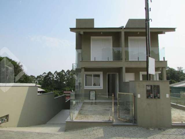 Casa em condomínio fechado com 3 quartos à venda na B, 451, Centro, Nova Santa Rita, 130 m2 por R$ 474.050