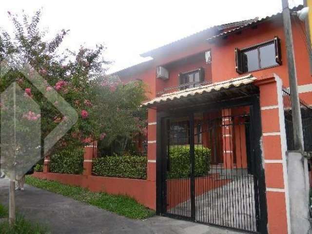 Casa em condomínio fechado com 4 quartos à venda na Rua das Petúnias, 144, Estância Velha, Canoas, 214 m2 por R$ 1.130.000