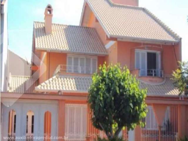 Casa em condomínio fechado com 4 quartos à venda na Rua das Petúnias, 352, Estância Velha, Canoas, 270 m2 por R$ 898.200