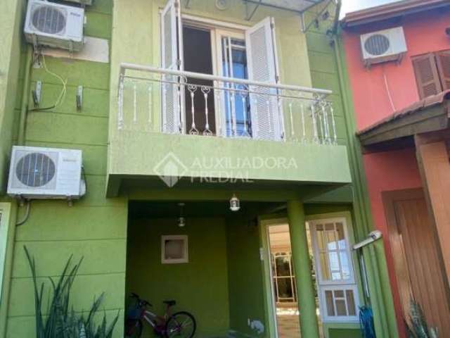 Casa em condomínio fechado com 3 quartos à venda na Avenida Juca Batista, 1458, Cavalhada, Porto Alegre, 160 m2 por R$ 526.000