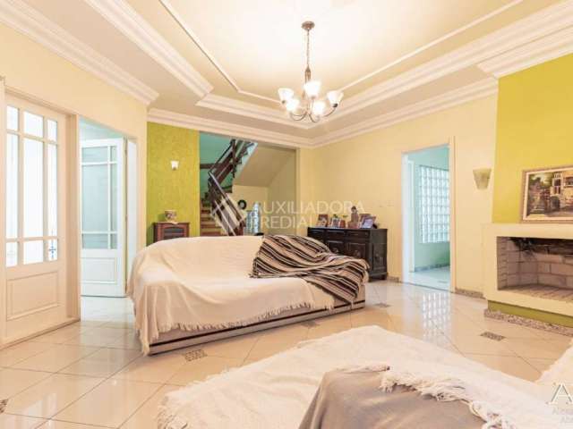 Casa com 5 quartos à venda na Rua Pero Vaz de Caminha, 571, Nossa Senhora das Graças, Canoas, 440 m2 por R$ 1.500.000