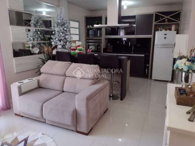 Casa em condomínio fechado com 2 quartos à venda na Rua Dezoito, 376, Olaria, Canoas, 55 m2 por R$ 370.500