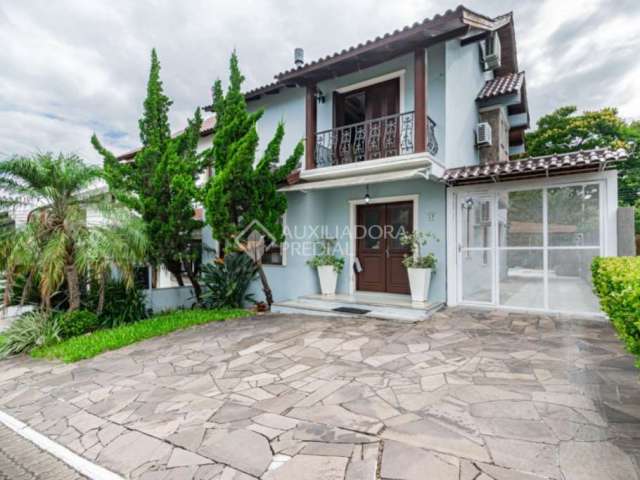 Casa em condomínio fechado com 3 quartos à venda na Avenida Edgar Pires de Castro, 540, Hípica, Porto Alegre, 220 m2 por R$ 970.000
