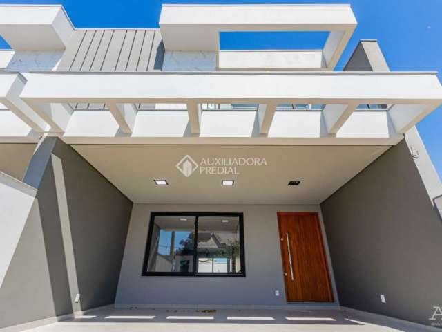 Casa com 3 quartos à venda na Rua Manacás, 28, Estância Velha, Canoas, 174 m2 por R$ 1.249.000