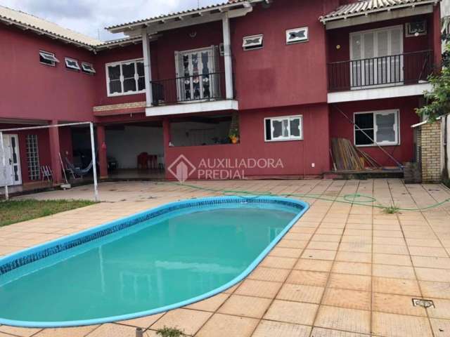Casa em condomínio fechado com 5 quartos à venda na Rua Fermino Correa da Gama, 381, Vila Monte Carlo, Cachoeirinha, 440 m2 por R$ 1.400.000