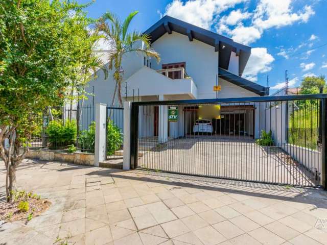 Casa em condomínio fechado com 4 quartos à venda na DOUTOR SEZEFREDO AZAMBUJA VIEIRA, 308, Jardim do Lago, Canoas, 327 m2 por R$ 1.500.000