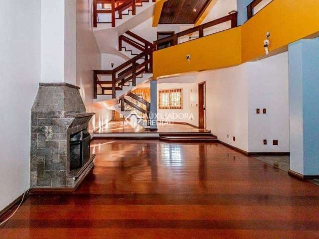 Casa com 4 quartos à venda na Rua Paul Harris, 107, Jardim Itu Sabará, Porto Alegre, 431 m2 por R$ 1.200.000