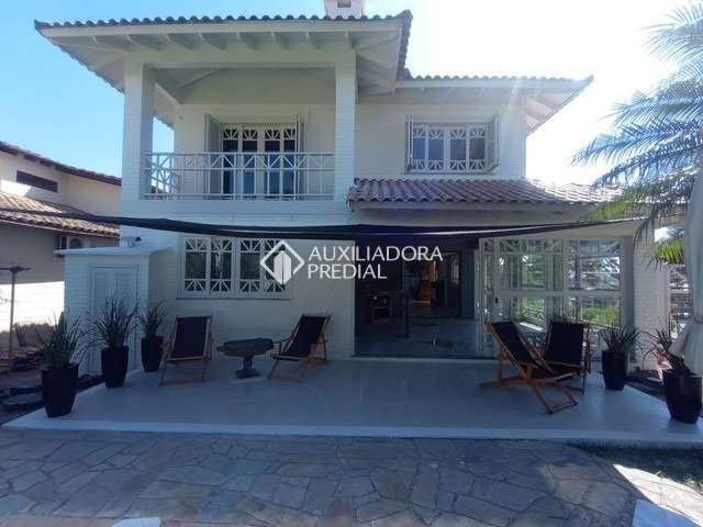 Casa em condomínio fechado com 3 quartos à venda na Estrada Capitão Gentil Machado de Godoy, 4500, Vila Elsa, Viamão, 297 m2 por R$ 1.595.000