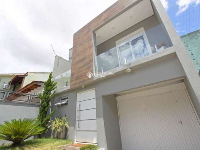 Casa em condomínio fechado com 3 quartos à venda na Rua Barão de Bagé, 430, Vila Jardim, Porto Alegre, 250 m2 por R$ 890.000