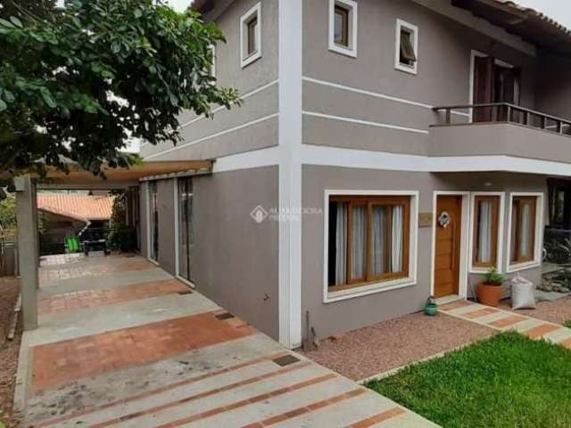 Casa em condomínio fechado com 4 quartos à venda na CAROBA (CANTEGRIL II), 247, Cantegril, Viamão, 260 m2 por R$ 900.000