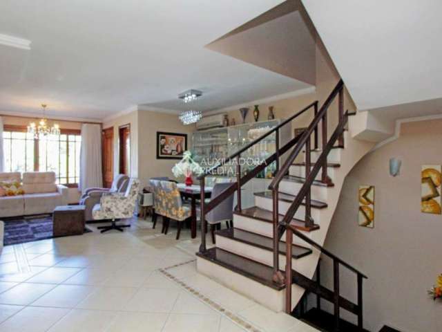 Casa com 4 quartos à venda na Rua Alberto Silva, 830, Vila Ipiranga, Porto Alegre, 285 m2 por R$ 1.100.000