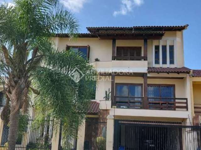 Casa em condomínio fechado com 4 quartos à venda na Rua Maestro Salvador Campanella, 116, Jardim Itu Sabará, Porto Alegre, 410 m2 por R$ 1.400.000