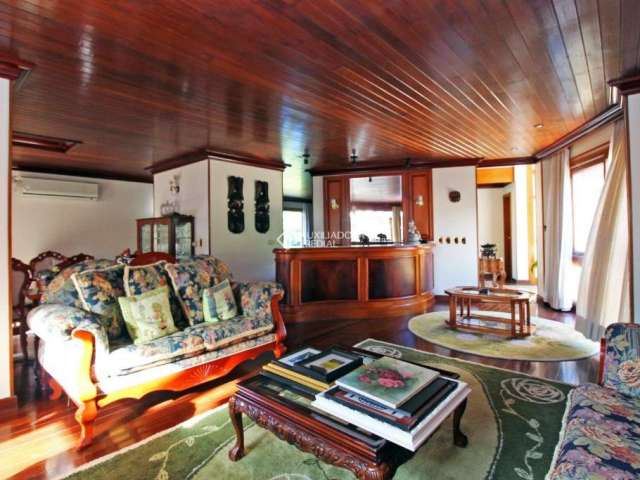Casa em condomínio fechado com 6 quartos à venda na Avenida da Cavalhada, 5205, Cavalhada, Porto Alegre, 888 m2 por R$ 4.770.000