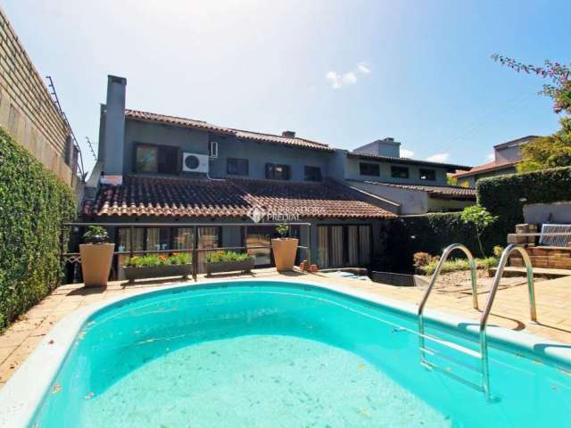 Casa com 4 quartos à venda na Rua Dona Lida Monteiro, 140, Teresópolis, Porto Alegre, 195 m2 por R$ 1.275.000