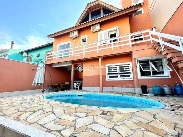Casa com 4 quartos à venda na Rua Abaeté, 771, Sarandi, Porto Alegre, 329 m2 por R$ 1.790.000