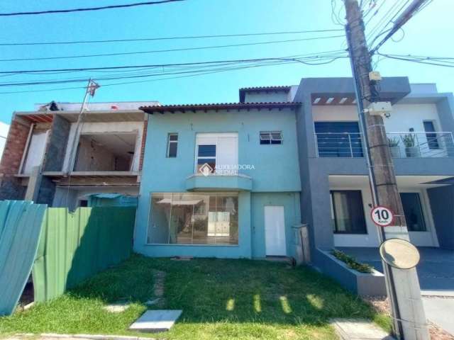 Casa em condomínio fechado com 2 quartos à venda na Rua Deputado Hugo Mardini, 1780, Passo das Pedras, Porto Alegre, 170 m2 por R$ 450.000