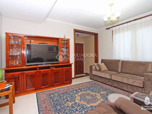 Casa em condomínio fechado com 3 quartos à venda na Rua Roque Calage, 549, Passo da Areia, Porto Alegre, 192 m2 por R$ 1.300.000