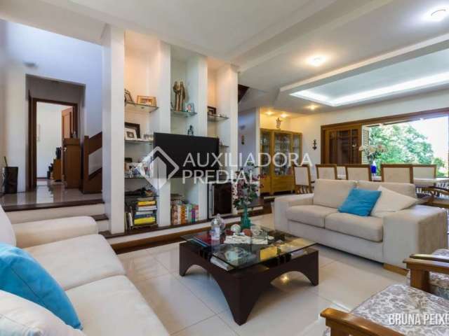 Casa em condomínio fechado com 4 quartos à venda na Rua Caeté, 950, Vila Assunção, Porto Alegre, 321 m2 por R$ 1.450.000