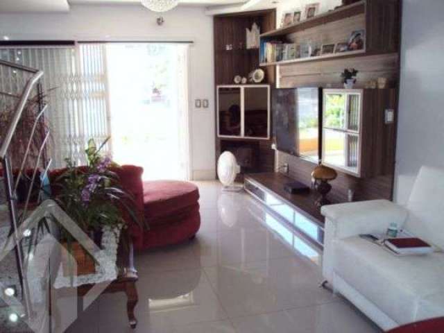 Casa em condomínio fechado com 4 quartos à venda na Rua Arnaldo Ballve, 512, Jardim Itu Sabará, Porto Alegre, 396 m2 por R$ 1.200.000
