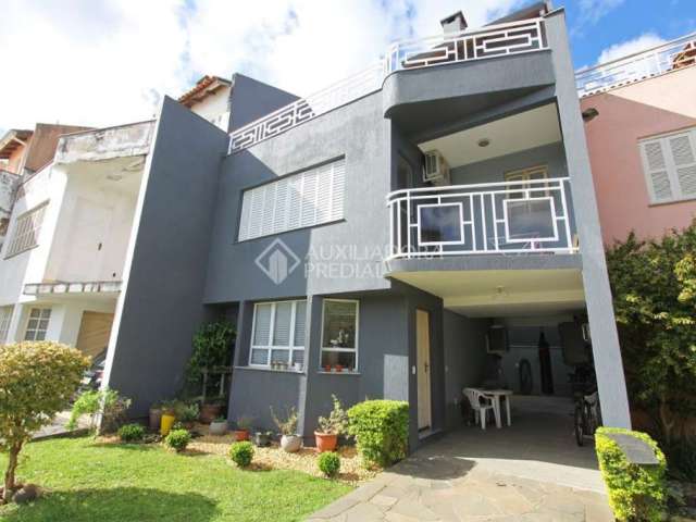 Casa em condomínio fechado com 3 quartos à venda na Rua Elízio Abate Crivella, 360, Jardim Itu Sabará, Porto Alegre, 193 m2 por R$ 895.000