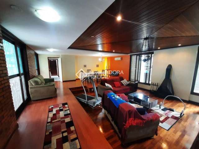 Casa em condomínio fechado com 4 quartos para alugar na Rua Álvaro Vieira Guimarães, 240, Sarandi, Porto Alegre, 650 m2 por R$ 12.000