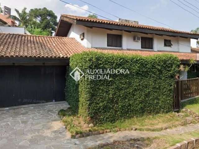 Casa em condomínio fechado com 4 quartos à venda na Avenida Engenheiro Alfredo Correa Daudt, 345, Boa Vista, Porto Alegre, 412 m2 por R$ 1.662.000