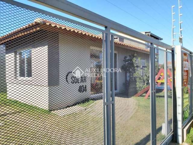 Casa em condomínio fechado com 2 quartos à venda na Rua Santa Mônica, 404, Ponta Grossa, Porto Alegre, 60 m2 por R$ 205.000