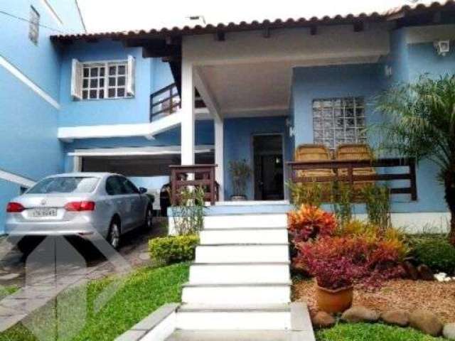Casa em condomínio fechado com 5 quartos à venda na Rua Doutor Pitrez, 191, Aberta dos Morros, Porto Alegre, 214 m2 por R$ 900.000