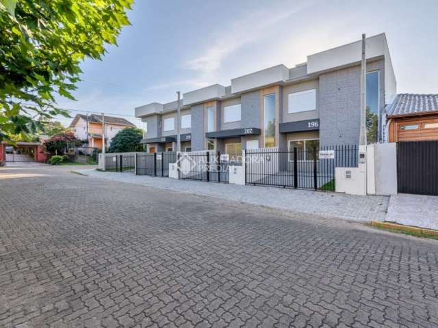 Casa com 3 quartos à venda na Londres, 202, Oeste, Sapiranga, 86 m2 por R$ 419.000