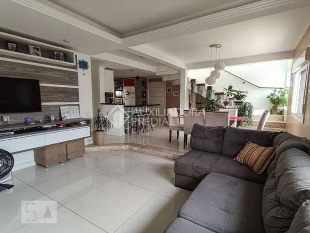 Casa em condomínio fechado com 4 quartos à venda na Rua Guanabara, 192, Ouro Branco, Novo Hamburgo, 270 m2 por R$ 800.000