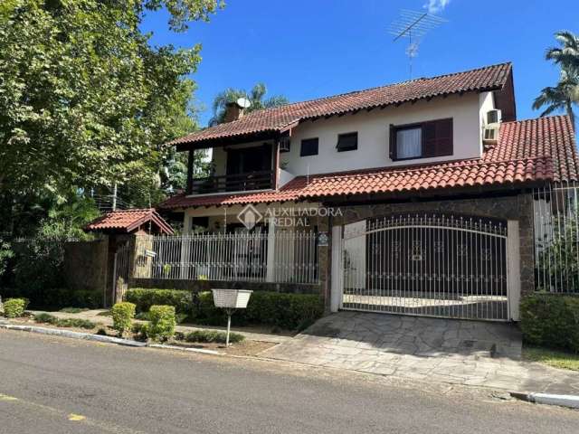 Casa em condomínio fechado com 4 quartos à venda na Rua Encruzilhada do Sul, 505, Mauá, Novo Hamburgo, 238 m2 por R$ 870.000
