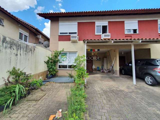 Casa em condomínio fechado com 3 quartos à venda na Rua Guia Lopes, 968, Rondônia, Novo Hamburgo, 126 m2 por R$ 479.000