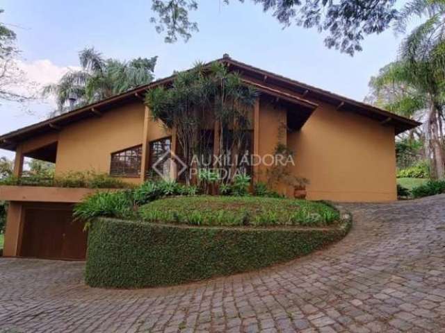 Casa com 5 quartos à venda na Rua Doutor Karl Wilhelm Schinke, 1010, Rondônia, Novo Hamburgo, 262 m2 por R$ 1.350.000